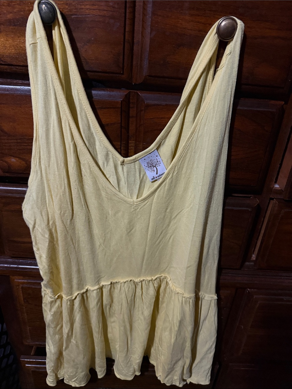 Self Esteem Yellow Sleeveless Peplum Top